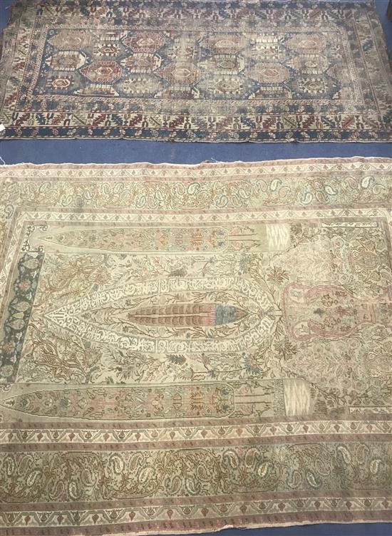 A Caucasian red and blue ground rug and a cream ground rug 190 x 100cm. and 180 x 135cm.